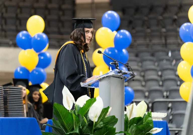 Kelly Cincotta speaking at spring nursing commencement ceremony
