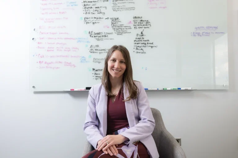 Jill Demirci sitting in office